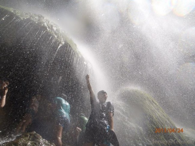 Enjoying the soothing downpour of water .