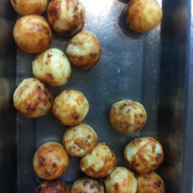 Hot takoyaki, ready for takeout. Yum!