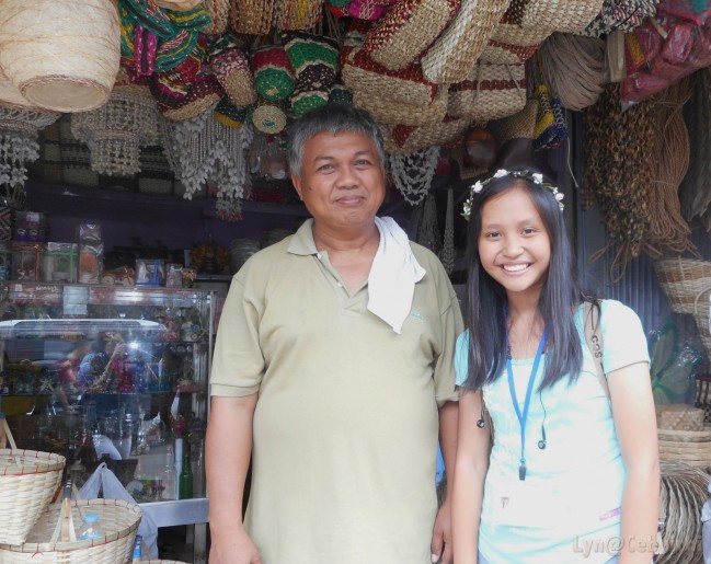 With Mr. Cris Tora, a souvenir shop owner.