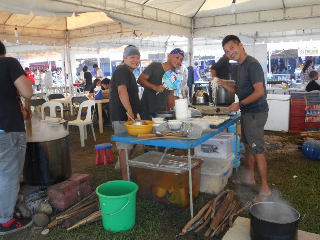 The noodle makers smile for the camera!