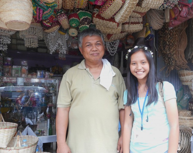 With Mr. Cris Tora, the souvenir shop owner.