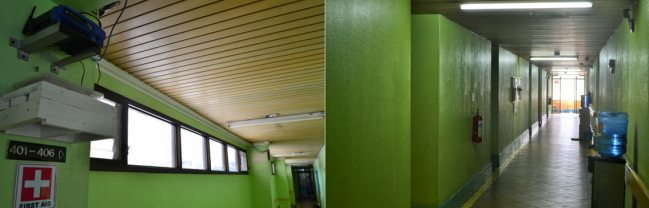 Several wifi routers and water dispensers are installed along the hallway of the dormitory.