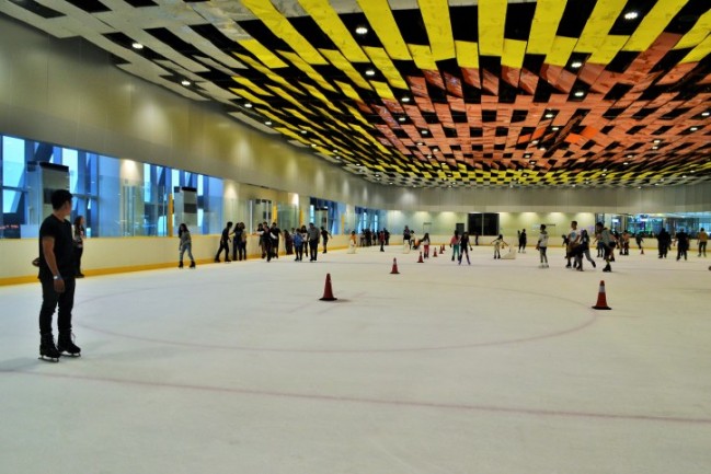 To prevent collisions, skaters must follow the counter-clockwise flow of traffic. The cones you see are intended to form a rectangular enclosure designated for other skaters such as those having ice lessons.